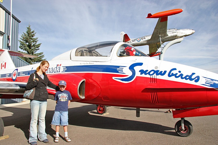 Sarah and Riley next to the Tutor Jet recently purchased by the Nanton Lancaster Museum.