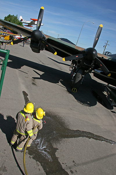 while two of Nanton's finest volunteer firefighters stood by...