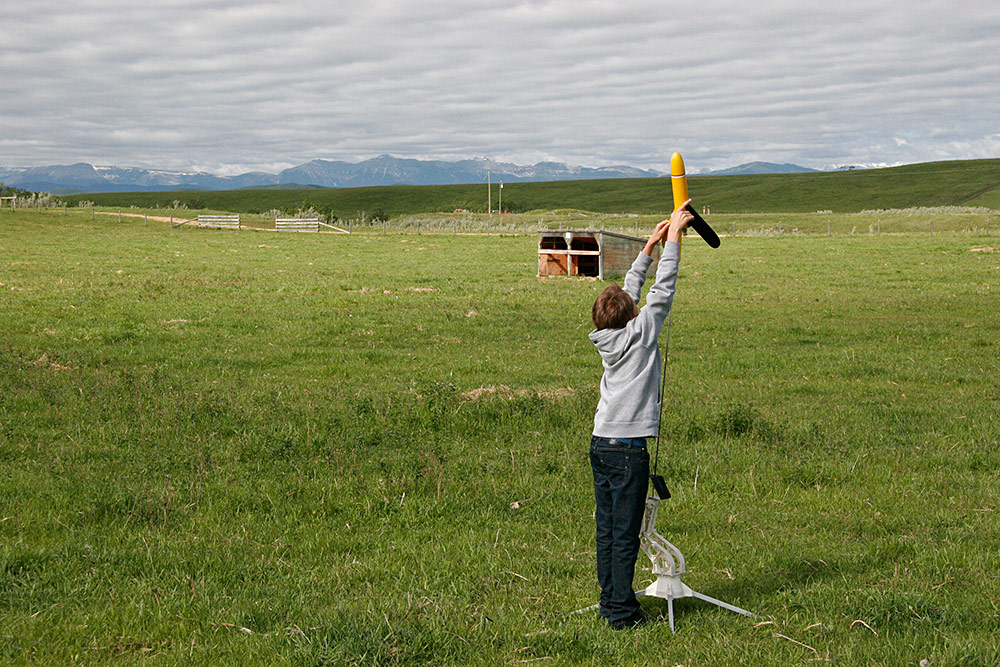 Riley putting the first rocket on the pad...