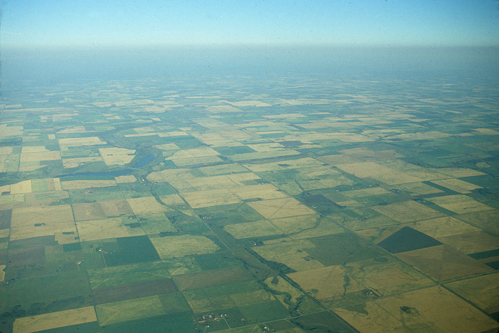 The beginning of a two week journey to the Arctic, <br />flying over southern Alberta farmland...