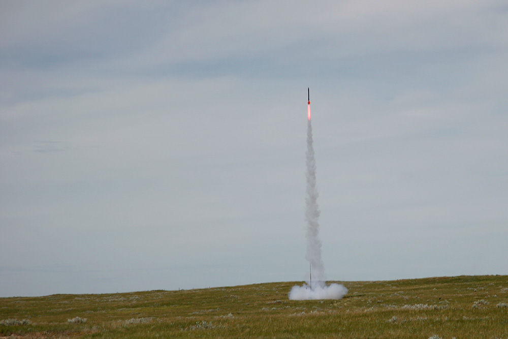 successful liftoff, on a twelve foot flame and about 800 lbs of thrust.<br />The rocket went very high but unfortunately the main deployed at apogee by <br />mistake. Greg eventually found the rocket about 3 km from the site.