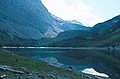 The first stop on the way to Mt. Joffre is the mysterious Hidden lake, which has no outflow channel. The headwall looms up behind. The route follows the left-hand shoreline to the opposite side.